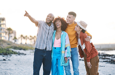 Image showing Beach, friends and people with view, gen z and fashion with smile, pointing and travel with hug outdoor. Happy in nature, ocean and urban streetwear style, adventure and friendship with students