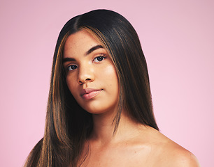 Image showing Portrait, hair care and woman with cosmetics, growth and skincare on a pink studio background. Face, person or model with natural beauty, aesthetic and dermatology with wellness and salon treatment