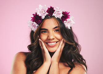 Image showing Beauty, flowers and hair with portrait of woman in studio for cosmetics, skincare and wellness. Self care, spa treatment and crown with person on pink background for spring, glow and makeup