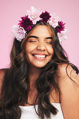 Image showing Woman, flowers and smile with crown on pink background for natural beauty, skincare and self care in studio. Face, happy model and floral hair band for sustainability, eco dermatology and cosmetics