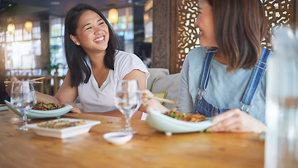 Image showing Sushi, restaurant and women friends with noodles, chopsticks and fish dish. Lunch, hungry Asian female person and Chinese meal with a friend happy from bonding and eating together at a table