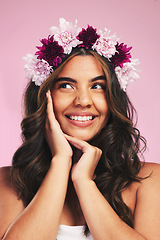 Image showing Woman, flowers and crown for thinking of beauty in studio with natural skincare, spring plants and pink background. Face, model and floral wreath for sustainable cosmetics, dermatology and hair care