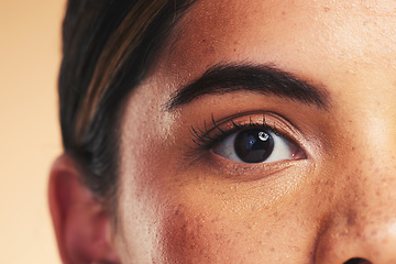 Image showing Woman, eye macro and beauty in studio portrait with beauty, cosmetics or natural glow on face by background. Girl, model and facial zoom with change, melasma or skin for microblading, shine and clean