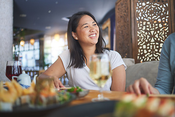 Image showing Japanese woman, sushi restaurant and smile for eating, thinking and conversation for fine dining at party. Asian friends, fish and healthy with culture, traditional or fast food in diner, bar or shop