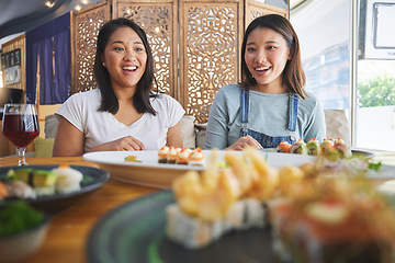 Image showing Happy women friends, sushi restaurant and eating with surprise, comic laugh, catering and plate. Japanese students, wow and excited with fish, seafood and diner with nutrition, hungry and thinking