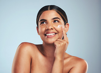 Image showing Face, cosmetics cream and portrait of woman with aesthetic shine, dermatology and skincare makeup on studio background. Happy model thinking of facial sunscreen lotion for self care, beauty and glow