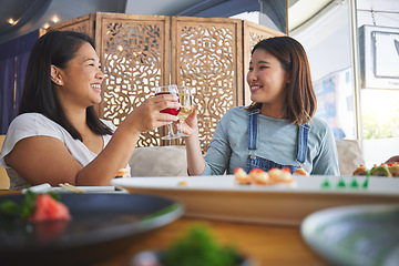 Image showing Japanese women, restaurant and toast with sushi, smile and congratulations with fine dining, party or thinking. Asian friends, happy and success with fish, alcohol or relax in diner, wine and thanks