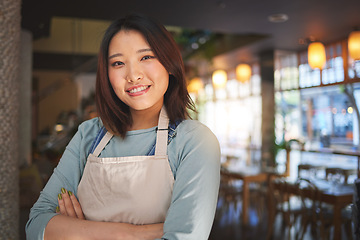 Image showing Portrait, happy asian woman or restaurant entrepreneur in small business with arms crossed for professional service. Cafeteria server, coffee shop waitress or confident manager working in hospitality