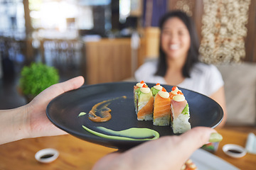 Image showing Sushi restaurant, people and waiter hands serving food plate, order or fish product for diner, cafeteria or shop customer. Startup small business, server and closeup person with lunch meal for client