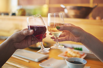 Image showing Hands, wine glass and friends toast in restaurant in celebration together. Alcohol, cheers and people drink champagne in cafe store at party, bonding or fine dining at luxury event with food on table