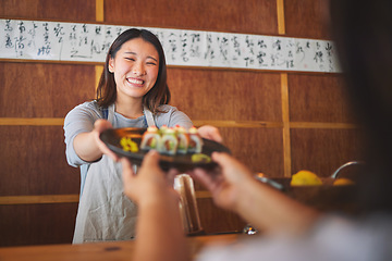 Image showing Sushi, restaurant worker and happy woman with serving food and Asian meal in a kitchen. Plate, female waiter smile at job or chef working with fish recipe for lunch order with cooking in Japanese bar