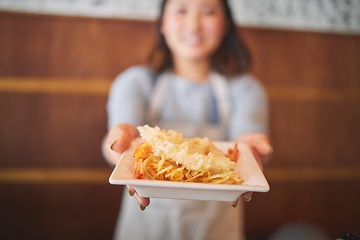 Image showing Hands, waitress and woman with seafood on plate, shrimp and tempura for eating at restaurant, cafe or store. Fish, food and person in sushi service, prawn and meat in fine dining, brunch and chips