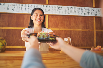 Image showing Sushi, restaurant worker job and woman with smile from food and Asian meal in a kitchen. Happy, female waiter or chef working with salmon roll lunch order with cooking in Japanese bar with service