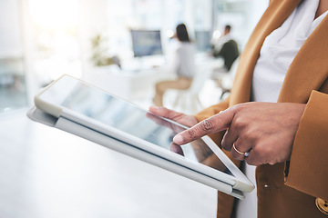 Image showing Hands, web design or businesswoman typing on tablet in office, working on email or research project online. Social media, tech or female editor editing or writing reports update on internet or blog