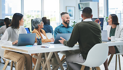 Image showing Planning, talking and business people in a meeting, brainstorming or conversation for new project, teamwork or laptop. Technology, men or women with ideas, cooperation or partnership with negotiation