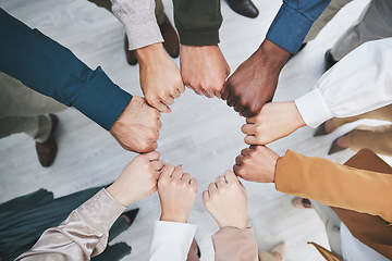 Image showing Hands, fist bump and team, support with solidarity and business people with top view and community. Synergy, cooperation and huddle, collaboration and corporate group with trust, meeting and mission