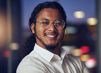 Image showing Happy, night and portrait of business man in office for professional, manager and accountant. Pride, corporate and smile with face of employee in Indian agency for finance, consulting and economy