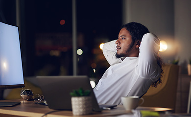 Image showing Thinking, night and a business man in his office to relax or finish a task for project management or future growth. Vision, mindset and a corporate employee planning in a professional workplace