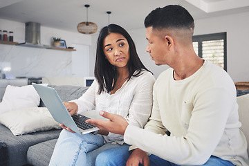 Image showing Couple, laptop and decision, doubt on sofa for online shopping or business idea in living room or home. Computer, man and woman with choice on internet for financial planning with tech subscription