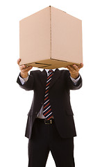 Image showing businessman holding a package