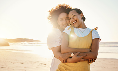 Image showing Portrait, hug and lgbt couple on the beach together for romance or relationship bonding on a date. Mockup, sunset and a gay woman with her lesbian girlfriend by the sea or ocean for their honeymoon