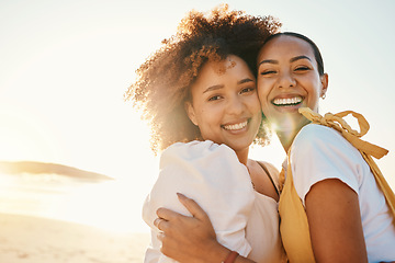 Image showing Portrait, sunset and a gay couple hugging on the beach together for romance or bonding on a date. Face, love and a gay woman with her lesbian girlfriend by the sea or ocean on nature mockup space
