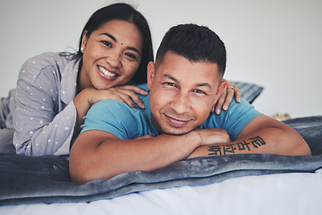 Image showing Portrait, bed or happy couple in home with love, care or support while bonding to relax in home together. Morning, man or woman lying in bedroom with smile, peace or loyalty in marriage commitment