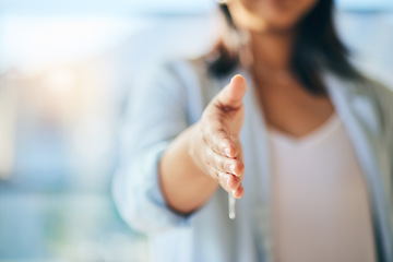 Image showing Closeup hand, business and woman with handshake, partnership and agreement with professional, b2b meeting and welcome. Hello, person and employee shaking hands for cooperation, onboarding and deal