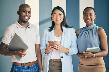 Image showing Smile, happy and portrait of business people in the office with confidence and happiness. Diversity, career and face of a team of professional young creative designers standing in a modern workplace.