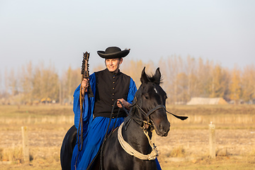 Image showing Hungarian csikos horseman in traditional folk costume