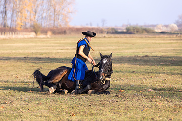 Image showing Hungarian csikos horseman in traditional folk costume