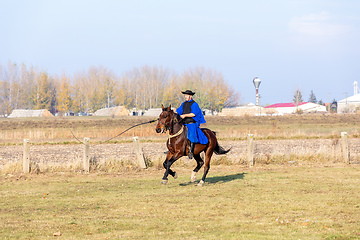 Image showing Hungarian csikos horseman in traditional folk costume