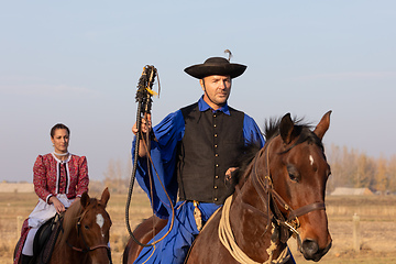 Image showing Hungarian csikos horseman in traditional folk costume