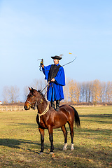 Image showing Hungarian csikos horseman in traditional folk costume