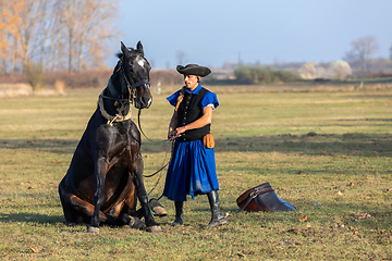 Image showing Hungarian csikos horseman in traditional folk costume