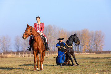 Image showing Hungarian csikos horseman in traditional folk costume