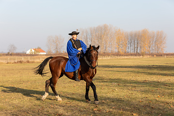 Image showing Hungarian csikos horseman in traditional folk costume