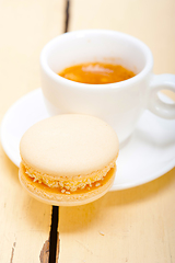 Image showing colorful macaroons with espresso coffee