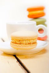 Image showing colorful macaroons with espresso coffee