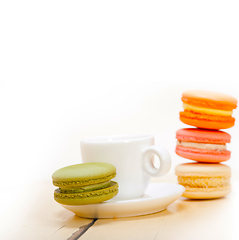 Image showing colorful macaroons with espresso coffee