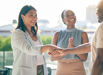 Image showing Business people, handshake and applause in collaboration, deal or agreement in city. Shaking hands, happy and group clapping in b2b partnership, celebration and congratulations in startup acquisition