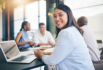 Image showing Portrait, business and woman in a meeting, laptop and brainstorming with ideas, cooperation and feedback. Face, Asian person or corporate professional with teamwork, planning for a project or support