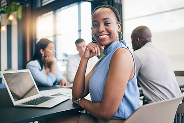 Image showing Portrait, business and black woman in a meeting, planning and brainstorming with ideas, laptop and feedback. Face, African person or corporate professional with teamwork, innovation and conversation