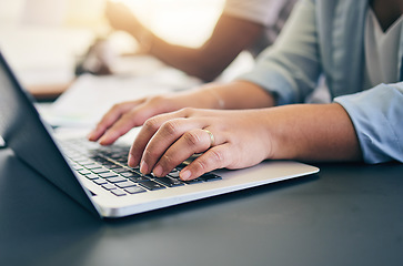 Image showing Laptop, keyboard and closeup of woman typing for online research for a project in the office. Technology, hands and female person working on a computer for a creative startup business in a workplace.