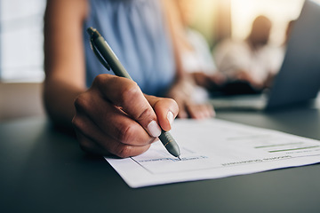 Image showing Closeup, hand and a person with a document for accounting, finance paperwork or business. Desk, office and an accountant or employee writing on a report or agreement for a salary or work income