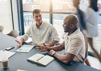 Image showing Business meeting, men and discussion, paperwork and planning with notebook, collaboration in conference room. Team, talking and notes with market research, ideas with strategy and working together