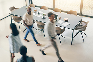 Image showing Above, busy office and fast walking business people for corporate career, moving and speed. Blur, morning and diversity of employees in the workplace together for a professional company in motion