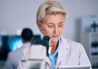 Image showing Science, tablet and medical with woman in laboratory for planning, research and pharmacy. Medicine, healthcare and digital report with mature scientist reading online for email, data and result