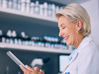 Image showing Science, tablet and smile with woman in laboratory for research, medical and pharmacy. Medicine, healthcare and digital report with mature scientist reading online for email, data and results