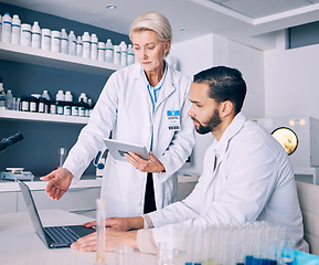 Image showing Scientist, mentor and training on computer and tablet for data analysis, laboratory report and pharmaceutical research. Science or medical woman and man talking, medicine support and digital solution